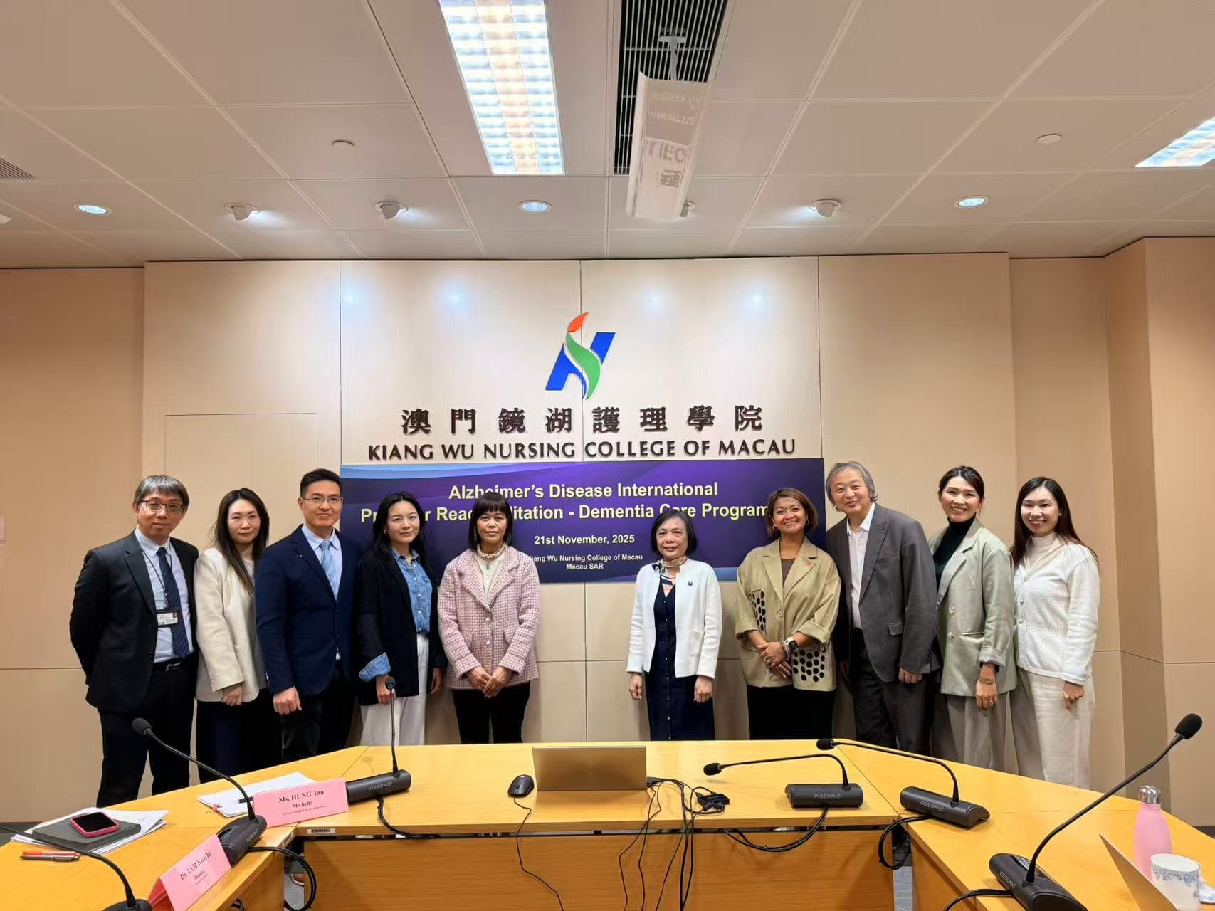 Emily Ong (fifth from the right) and Amalia (fourth from the right) hold a meeting with the course designers